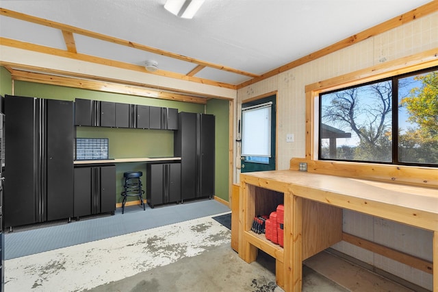 1043 Cheyenne, Los Alamos, NM 87544 - miscellaneous room featuring concrete floors