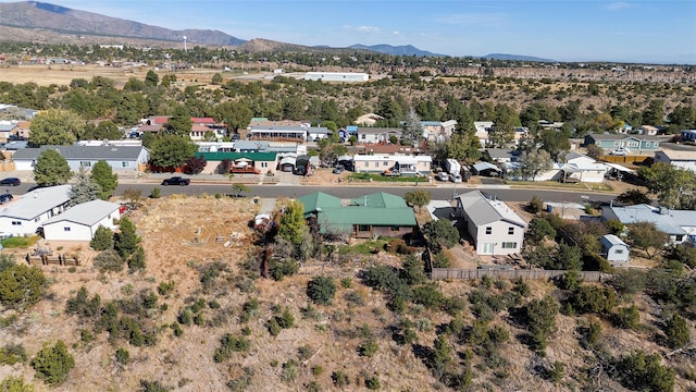 1043 Cheyenne, Los Alamos, NM 87544 - aerial view of property's location featuring a mountainous background and nearby suburban area
