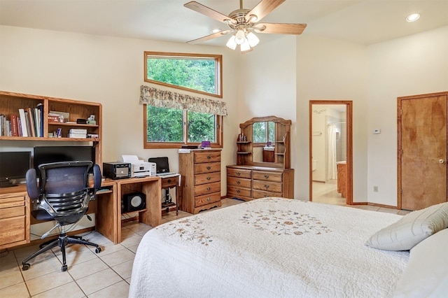 444 Aragon, White Rock, NM 87547 - bedroom featuring a towering ceiling, light tile patterned floors, an office area, ensuite bathroom, and a ceiling fan