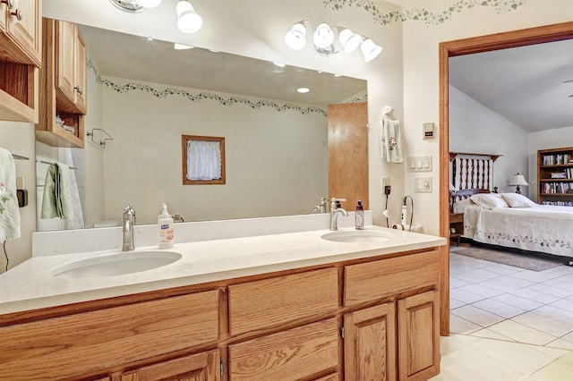444 Aragon, White Rock, NM 87547 - full bath featuring ensuite bathroom, double vanity, tile patterned floors, and lofted ceiling