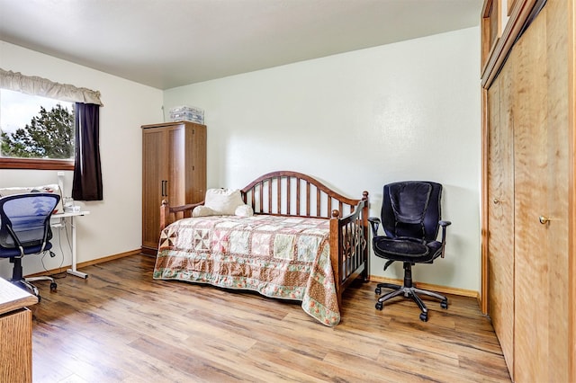 444 Aragon, White Rock, NM 87547 - bedroom with wood finished floors and baseboards