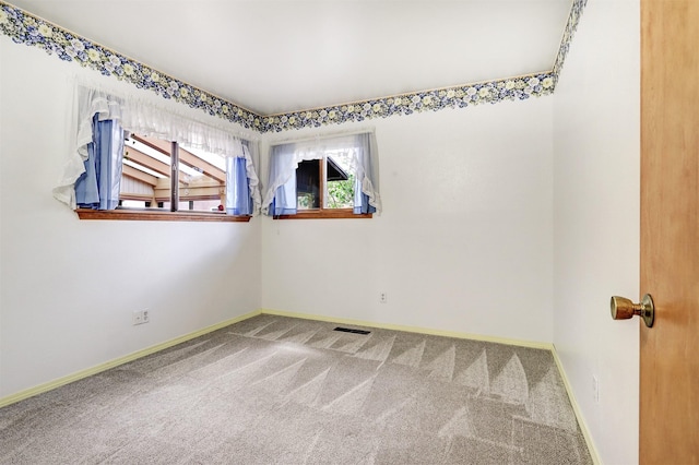 444 Aragon, White Rock, NM 87547 - carpeted empty room featuring baseboards