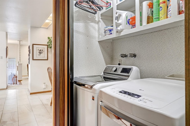 444 Aragon, White Rock, NM 87547 - washroom with washer and clothes dryer and baseboards