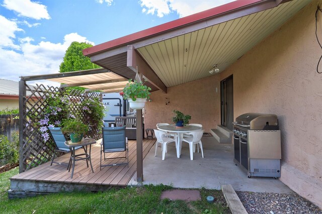 444 Aragon, White Rock, NM 87547 - view of patio with area for grilling, outdoor dining area, and a deck