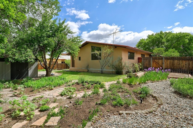 444 Aragon, White Rock, NM 87547 - back of house with stucco siding and an outdoor structure