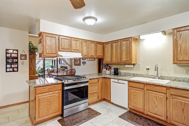 444 Aragon, White Rock, NM 87547 - kitchen featuring gas stove, a sink, dishwasher, under cabinet range hood, and light stone countertops