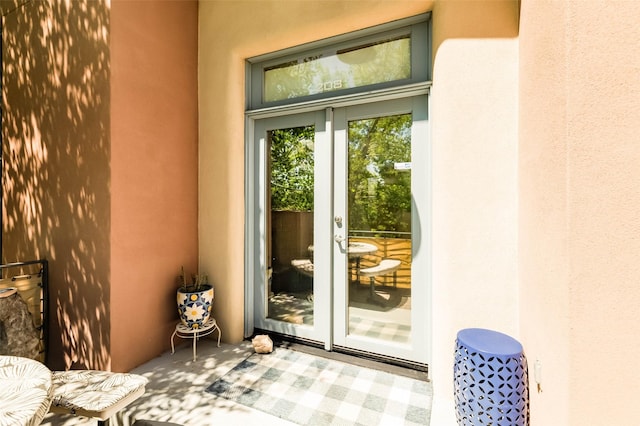 3600 Cerrillos Unit 208, Santa Fe, NM 87507 - property entrance with french doors and stucco siding