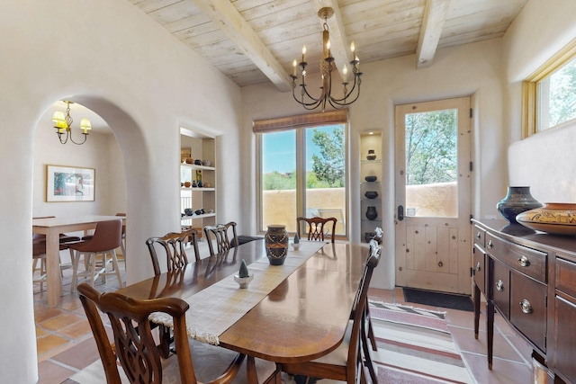 425 Calle Kokopelli, Santa Fe, NM 87501 - dining room with a chandelier, wood ceiling with exposed beams, and arched walkways