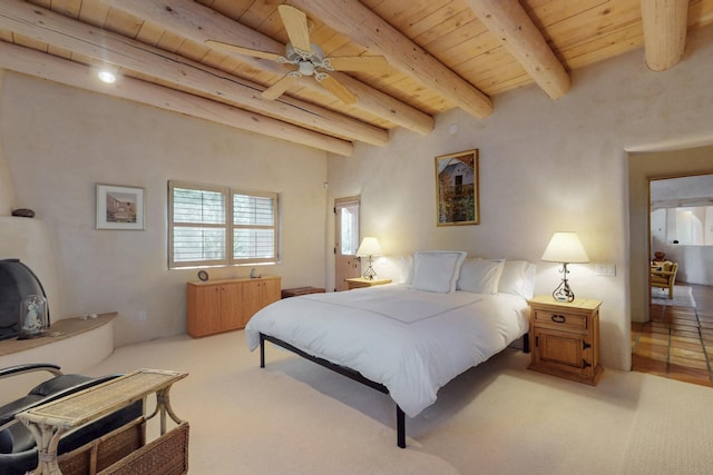 425 Calle Kokopelli, Santa Fe, NM 87501 - carpeted bedroom featuring wood ceiling with exposed beams