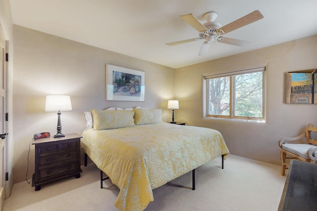 425 Calle Kokopelli, Santa Fe, NM 87501 - bedroom featuring light colored carpet and ceiling fan