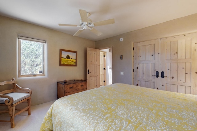 425 Calle Kokopelli, Santa Fe, NM 87501 - bedroom with a ceiling fan and light carpet