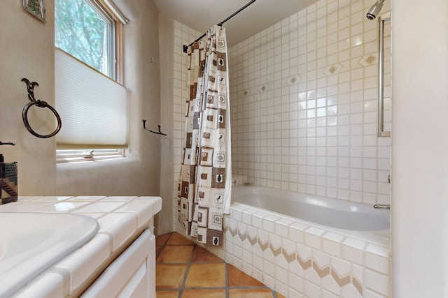 425 Calle Kokopelli, Santa Fe, NM 87501 - bathroom with healthy amount of natural light, tile patterned floors, tiled shower / bath combo, and vanity