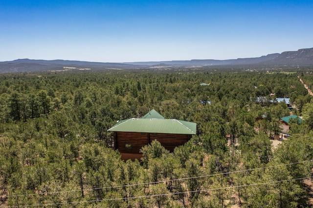 76 Los Altos De Cicuye, Pecos, NM 87552 - drone / aerial view of a heavily wooded area and a mountainous background