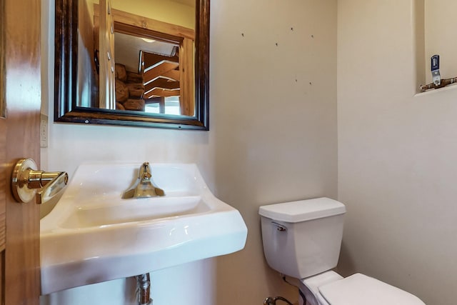 76 Los Altos De Cicuye, Pecos, NM 87552 - half bath featuring toilet and a sink
