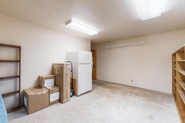 76 Los Altos De Cicuye, Pecos, NM 87552 - below grade area with freestanding refrigerator