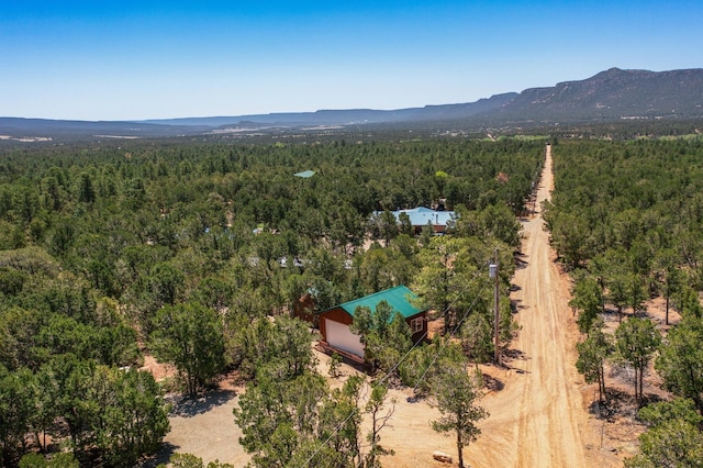 76 Los Altos De Cicuye, Pecos, NM 87552 - drone / aerial view of a heavily wooded area and mountains