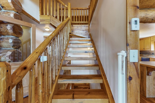 76 Los Altos De Cicuye, Pecos, NM 87552 - staircase with wood finished floors