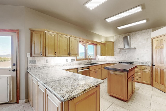 5 La Aguapa, Sandia Park, NM 87047 - kitchen with wall chimney range hood, a sink, light tile patterned floors, a peninsula, and stainless steel appliances