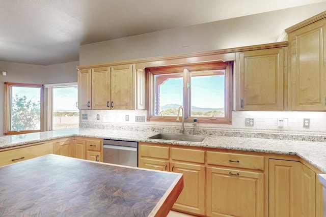 5 La Aguapa, Sandia Park, NM 87047 - kitchen with a sink, dishwasher, light brown cabinetry, and decorative backsplash