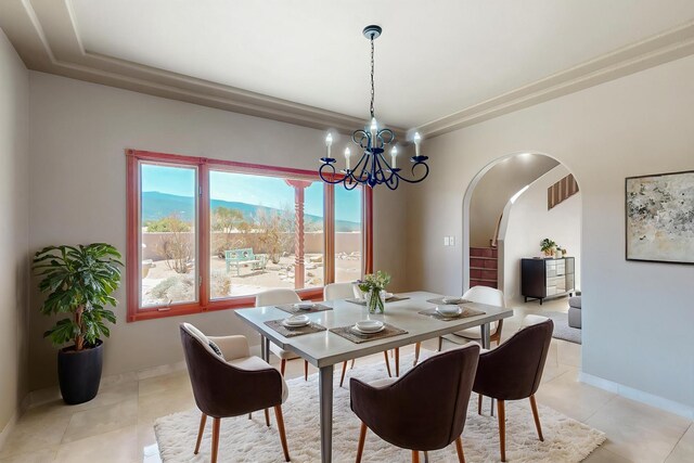 5 La Aguapa, Sandia Park, NM 87047 - unfurnished room with arched walkways, a chandelier, plenty of natural light, and a raised ceiling