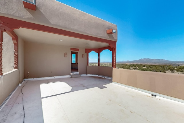5 La Aguapa, Sandia Park, NM 87047 - view of patio with a mountain view