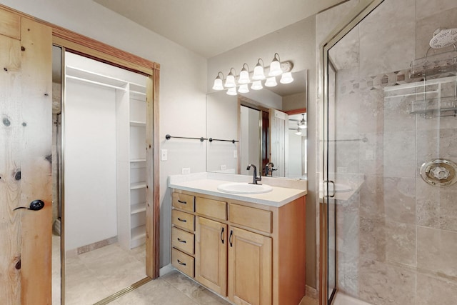 5 La Aguapa, Sandia Park, NM 87047 - full bath featuring a stall shower, vanity, and a walk in closet