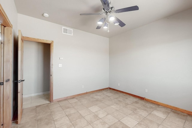 5 La Aguapa, Sandia Park, NM 87047 - empty room featuring a ceiling fan, baseboards, a smoke detector, and light tile patterned floors