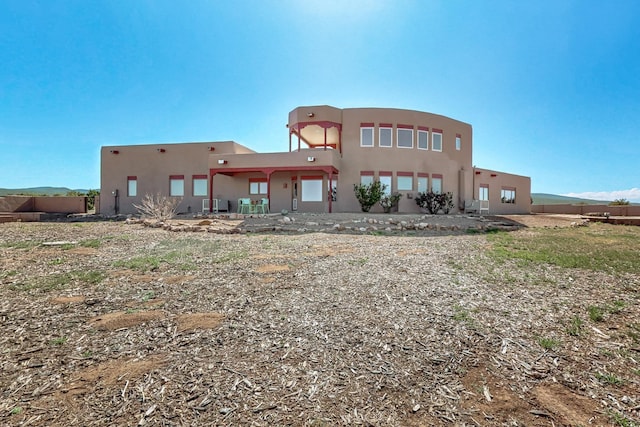 5 La Aguapa, Sandia Park, NM 87047 - rear view of property with stucco siding