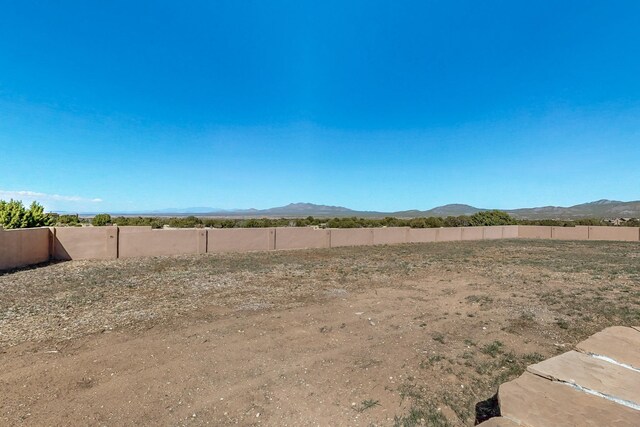 5 La Aguapa, Sandia Park, NM 87047 - view of yard featuring a mountain view