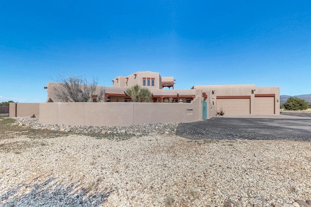 5 La Aguapa, Sandia Park, NM 87047 - view of yard featuring a garage