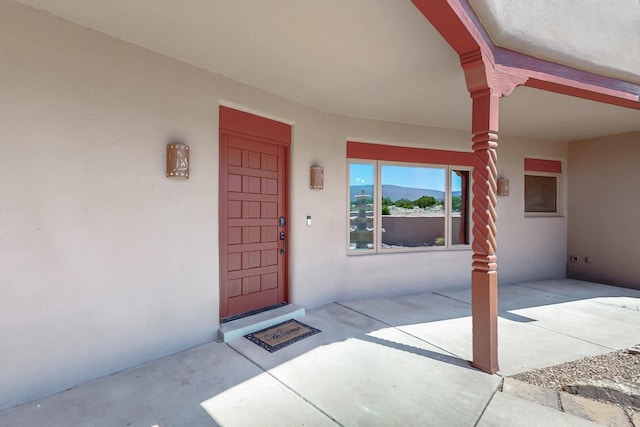 5 La Aguapa, Sandia Park, NM 87047 - doorway to property with stucco siding