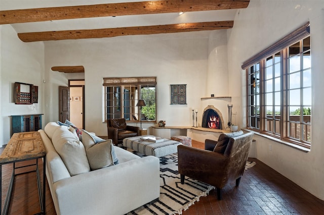 1050 Sierra Del Norte, Santa Fe, NM 87501 - living area featuring a fireplace and beamed ceiling