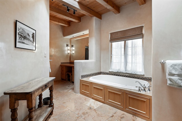 1050 Sierra Del Norte, Santa Fe, NM 87501 - bathroom featuring wooden ceiling with exposed beams, a bath, and vanity