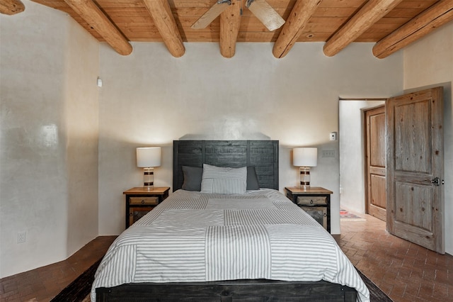 1050 Sierra Del Norte, Santa Fe, NM 87501 - bedroom with wooden ceiling with exposed beams and brick flooring