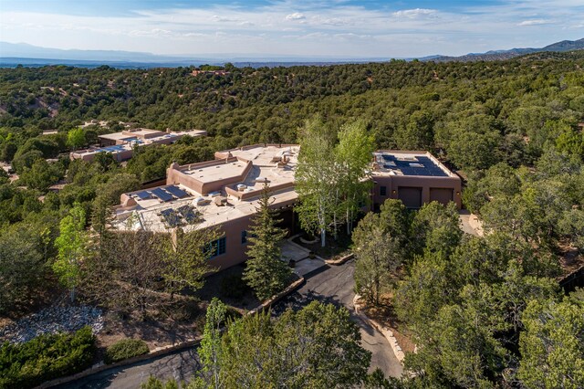 1050 Sierra Del Norte, Santa Fe, NM 87501 - view from above of property with a heavily wooded area