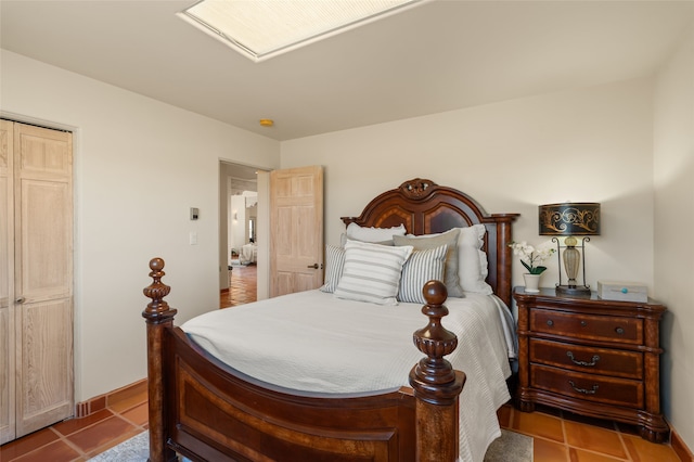 28 Camino Caballos, Lamy, NM 87540 - bedroom with tile patterned floors and baseboards