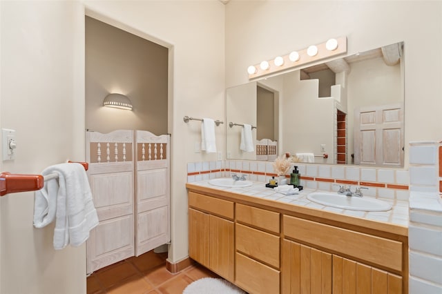 28 Camino Caballos, Lamy, NM 87540 - full bath featuring double vanity, backsplash, and tile patterned flooring