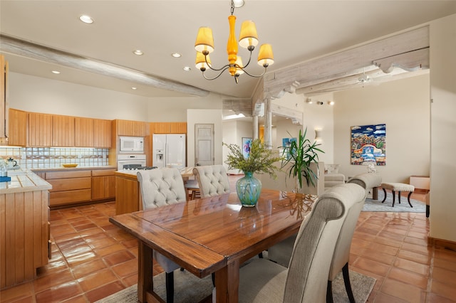 28 Camino Caballos, Lamy, NM 87540 - dining room featuring a chandelier, light tile patterned flooring, and recessed lighting