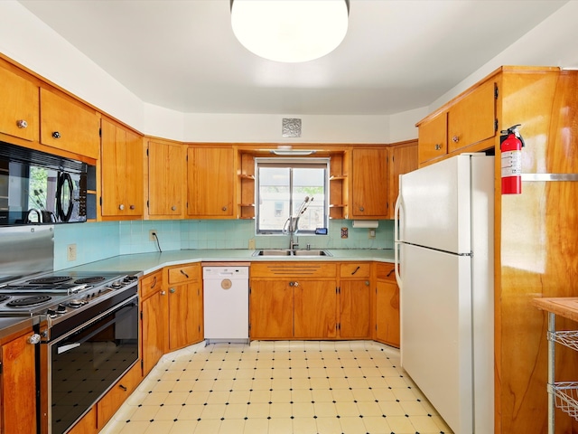 707 Middle San Pedro Rd, Espanola, NM 87532 - kitchen featuring white appliances, open shelves, light flooring, backsplash, and brown cabinets