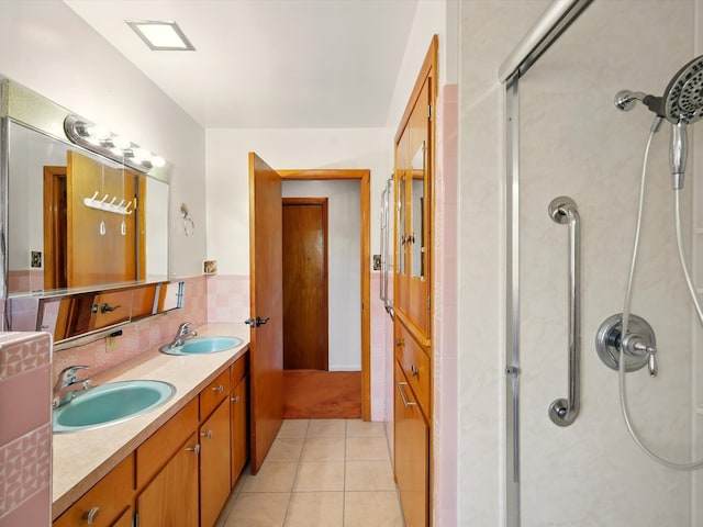 707 Middle San Pedro Rd, Espanola, NM 87532 - full bath with a shower stall, tile patterned flooring, and double vanity