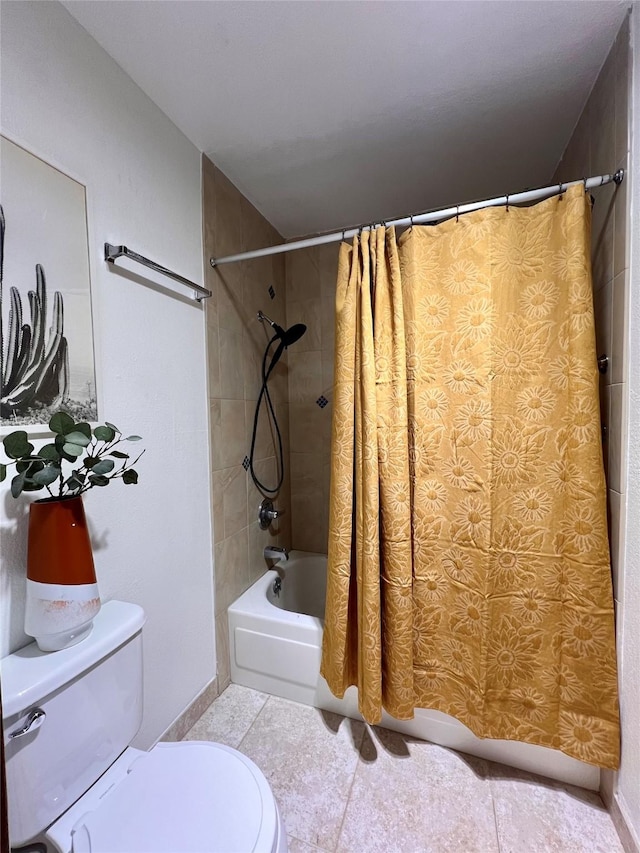 368 Bryce, White Rock, NM 87547 - bathroom featuring toilet, shower / bath combo with shower curtain, tile patterned floors, and baseboards