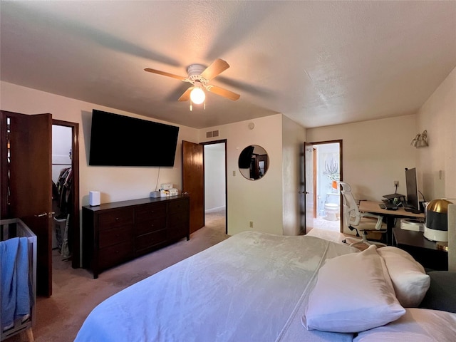 368 Bryce, White Rock, NM 87547 - bedroom featuring light colored carpet, an office area, ceiling fan, and ensuite bath