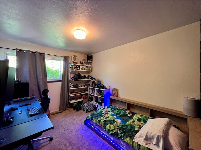 368 Bryce, White Rock, NM 87547 - bedroom featuring carpet flooring, a textured ceiling, and an office area