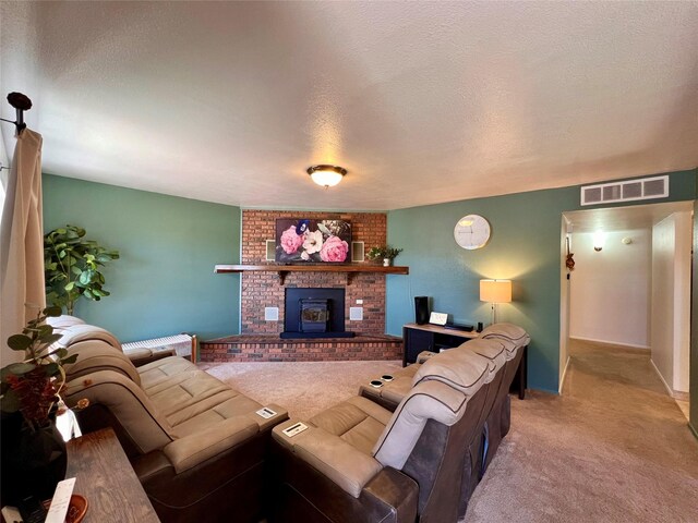 368 Bryce, White Rock, NM 87547 - living room with carpet flooring, a textured ceiling, and a fireplace