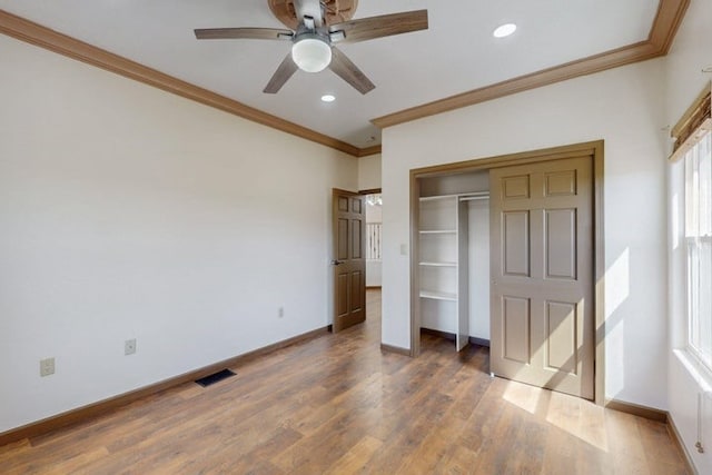 1521 Lakeview Rd SW, Albuquerque, NM 87105 - unfurnished bedroom featuring ornamental molding, baseboards, wood finished floors, a closet, and recessed lighting