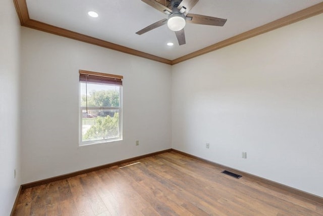 1521 Lakeview Rd SW, Albuquerque, NM 87105 - unfurnished room featuring crown molding, a ceiling fan, baseboards, wood finished floors, and recessed lighting