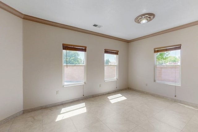 1521 Lakeview Rd SW, Albuquerque, NM 87105 - spare room with crown molding and baseboards