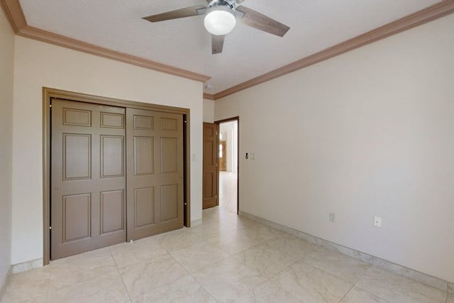 1521 Lakeview Rd SW, Albuquerque, NM 87105 - unfurnished bedroom featuring crown molding, baseboards, a ceiling fan, and a closet