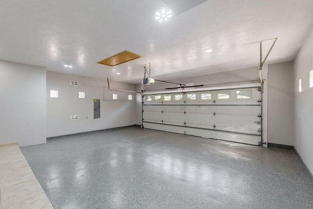 1521 Lakeview Rd SW, Albuquerque, NM 87105 - garage with electric panel and a garage door opener