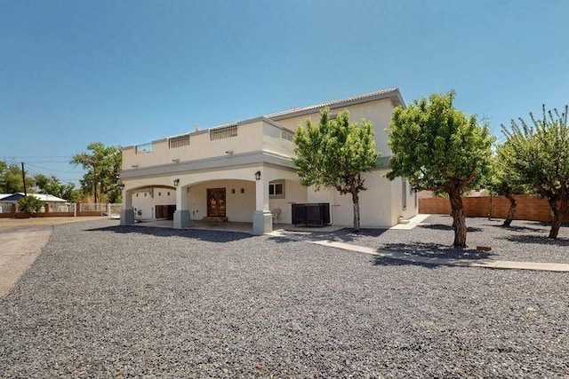 1521 Lakeview Rd SW, Albuquerque, NM 87105 - rear view of house with stucco siding